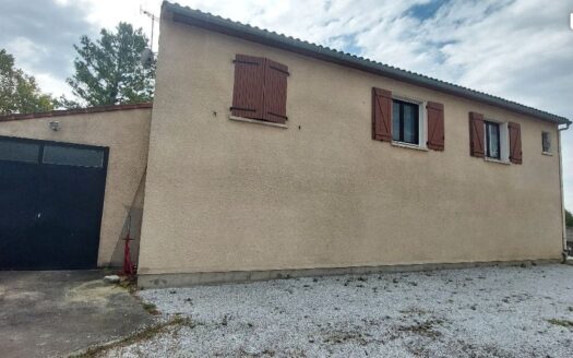 Maison avec sous-sol, garage et jardin clos